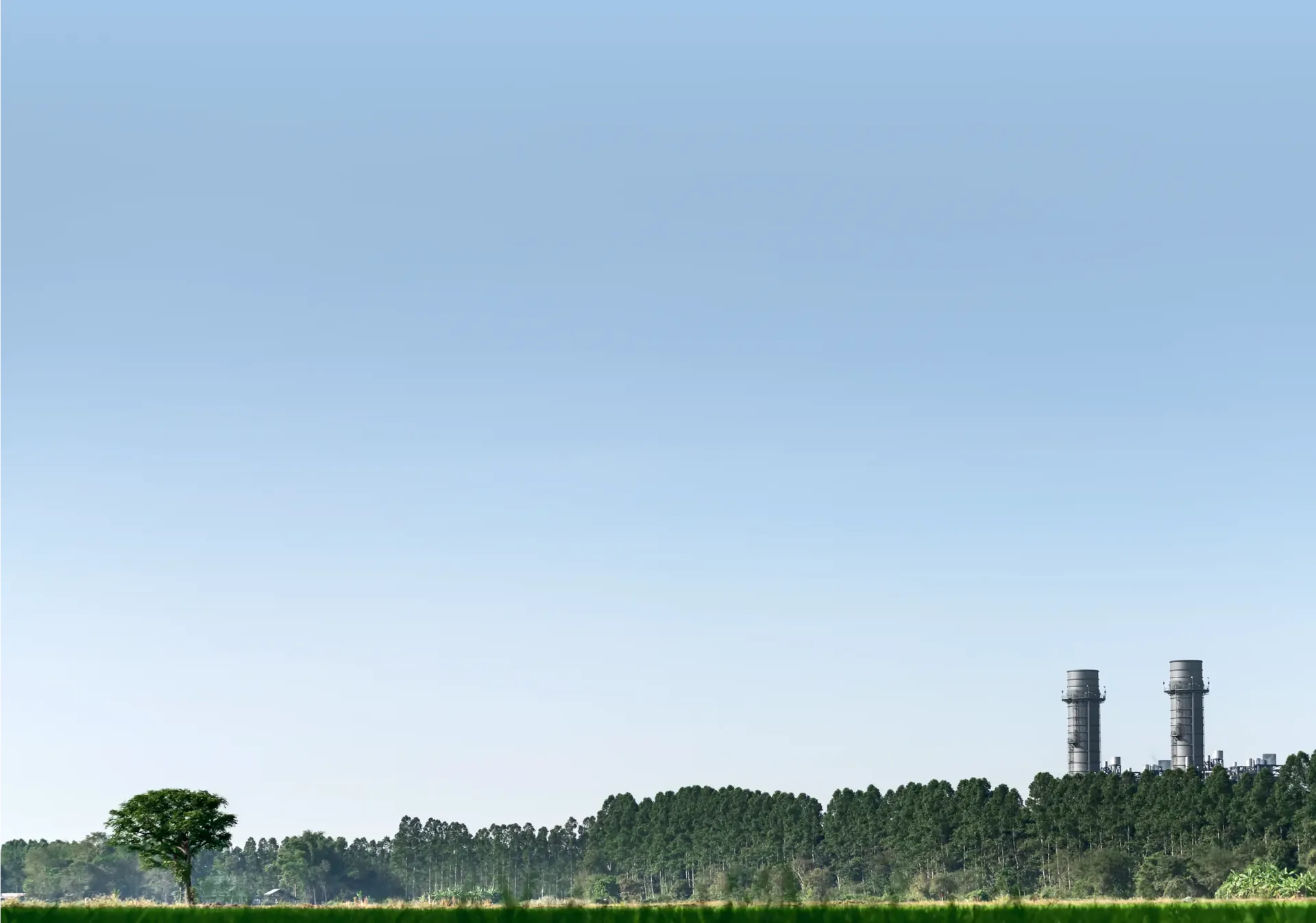 GULF power plant set among trees and green fields